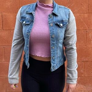 Denim jacket with heather gray sweatshirt-like long sleeves